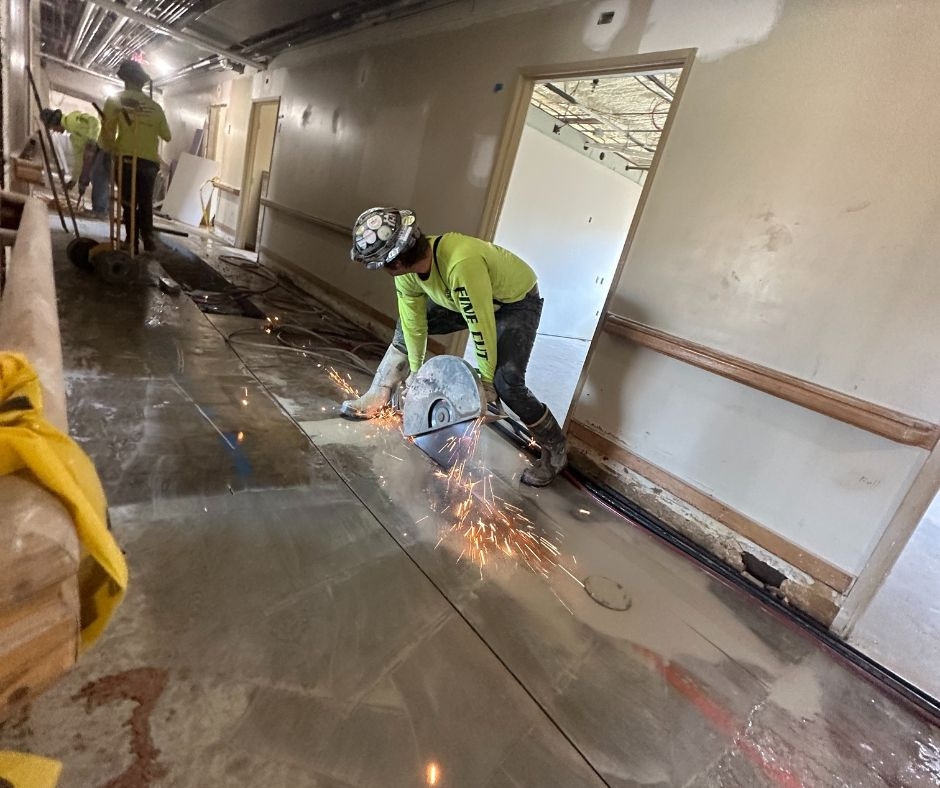 Fine Cut crew using concrete cutting equipment to create structural openings at a commercial jobsite.